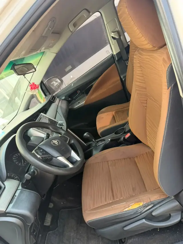 Driver cockpit inside our Kia Carnival